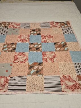 Handmade Patchwork Baby Quilt in Coral, Blue, and Brown